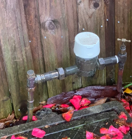 Corroded pressure limiting valve at a Sydney water meter before replacement